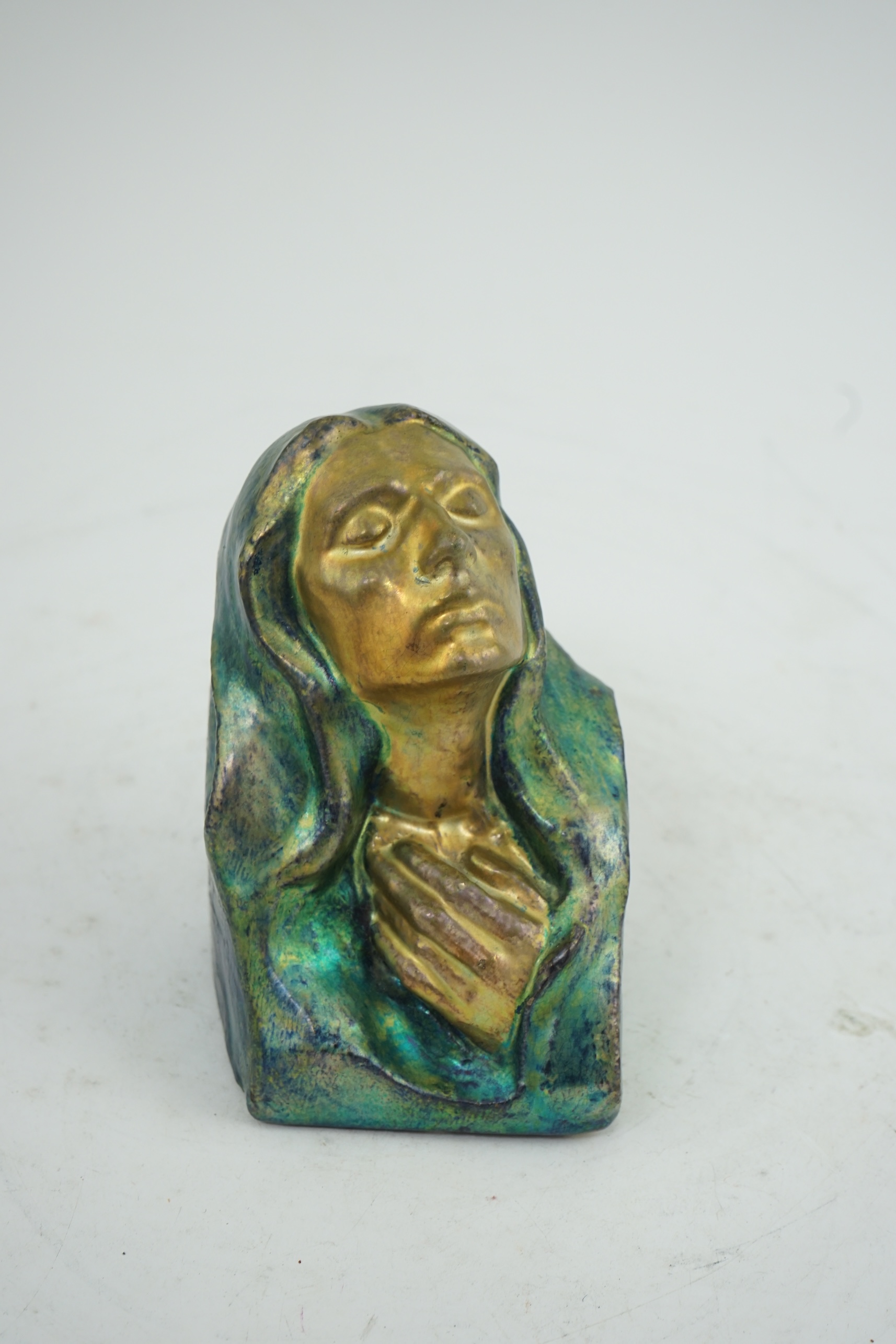 A rare Zsolnay eosin lustre bust of Madonna, modelled by Julia Laszlo Zsolnay, c.1910